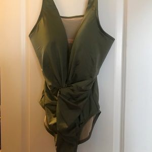One pice bathing suit new with tags.